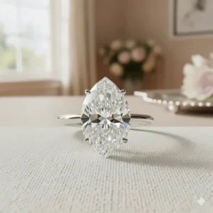 Close-up of a brilliant cut 2 carat pear shaped diamond ring in a classic solitaire setting.