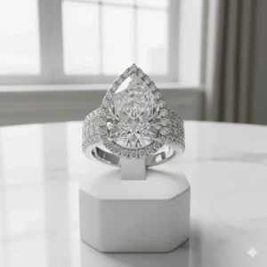Showcasing a large pear halo engagement ring to illustrate how the setting enhances the center stone's size.