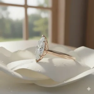 Marquise solitaire engagement ring featuring a secure, low-profile setting to protect the elegant pointed tips.