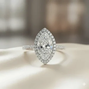 A breathtaking 4 to 5 carat marquise diamond ring encircled by a sparkling micro-pavé halo on a white gold band.