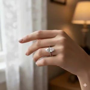 The large size of a 4 to 5 carat marquise diamond ring worn elegantly on a woman's hand, demonstrating its finger-slimming effect.
