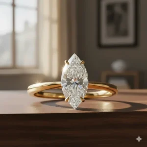 A 1.5 carat Marquise Diamond Ring set in a modern yellow gold solitaire setting.