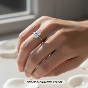 A marquise engagement ring worn on a hand, demonstrating the diamond's flattering, finger-elongating effect.