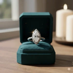 The marquise diamond ring sparkling inside a velvet ring box, ready for a wedding proposal.