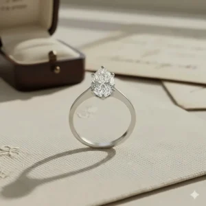 Classic vintage marquise engagement ring solitaire with a prong setting showcasing the unique boat-like shape of the diamond.