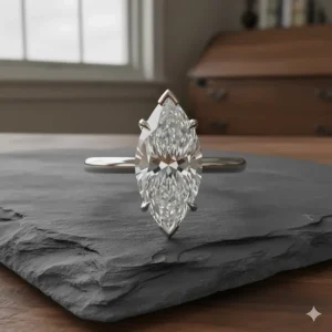 Close-up showing the security of the V-tip prongs essential for protecting the points of a marquise-cut engagement ring.