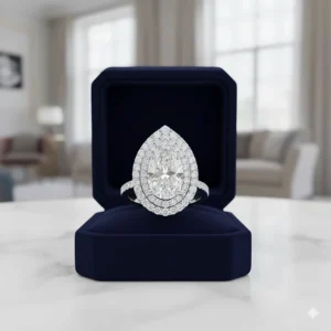 Luxurious pear halo engagement ring with a dazzling double halo of micro-pavé diamonds.