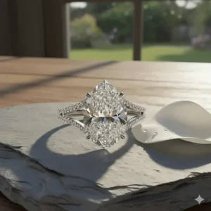 A bold pear shaped engagement ring with a split shank band that divides near the head of the ring for a wide, statement look.