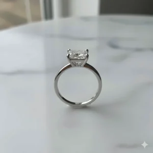 Detailed side view of the 2 carat princess cut diamond ring showing the basket setting.