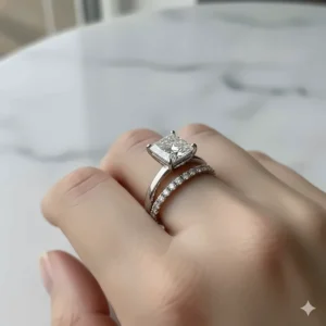 The 2 carat princess cut diamond ring beautifully paired with a matching pavé wedding band.