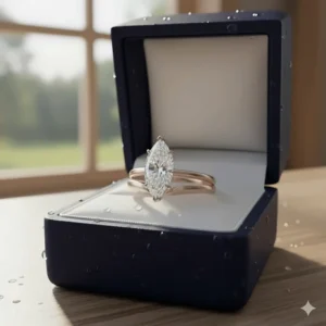 The solitaire marquise engagement ring presented in a luxury velvet box, perfect for a proposal.