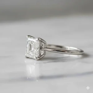 Side view of an Asscher cut wedding ring in a secure four-prong solitaire setting, demonstrating the stone's height and profile.