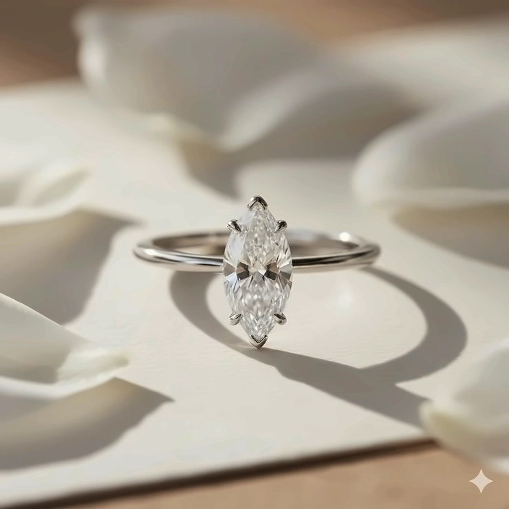 Example of a low-profile marquise solitaire ring setting, ideal for those who prefer a more secure, less raised design.