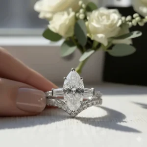 Marquise engagement ring featuring a slender pave wedding band to add extra sparkle and brilliance to the set.