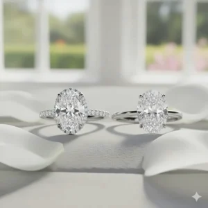 Comparison image showing an oval engagement ring with hidden halo next to a traditional oval solitaire to demonstrate the added volume and sparkle of the hidden halo setting.