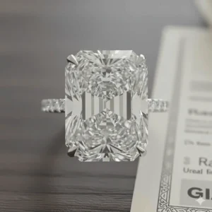 Macro shot illustrating the mixed brilliant/step-cut facet pattern of the high-clarity 3-carat radiant diamond.