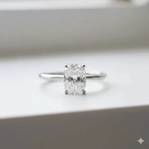 Elegant solitaire setting for a classic look, perfectly highlighting an elongated cushion cut engagement ring.