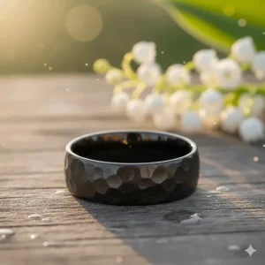 Alternative style: A robust hammered wedding band made from black tungsten carbide.