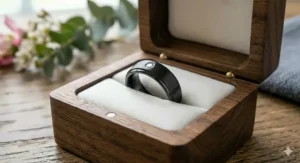 A luxury jewelry box holding a minimalist satin brushed wedding ring for a marriage proposal.