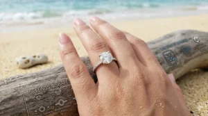 Classic solitaire lab grown diamond engagement ring featuring a round brilliant cut stone on a gold band