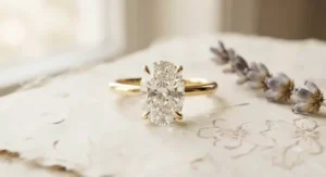 Stunning yellow gold oval engagement ring designed for a sophisticated look.