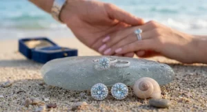 A stunning three stone aquamarine engagement ring flanked by two baguette cut side diamonds.