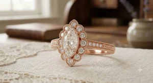 Vintage-inspired rose gold marquise ring showcasing an intricate diamond halo setting and milgrain detailing.