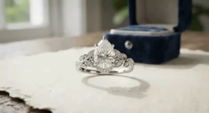 An exquisite custom-designed pear-shaped engagement ring, highlighting unique craftsmanship and high-quality diamond clarity.