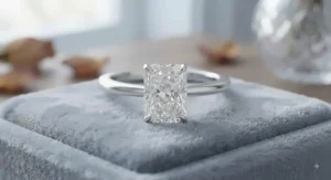 Elongated cushion cut engagement ring mounted on a sleek white gold band.
