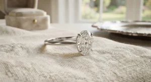 Minimalist womens solitaire engagement ring styled with a modern tapered profile.