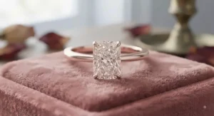 Romantic rose gold cushion cut engagement ring with a secure four-prong setting.