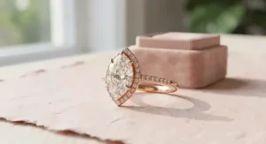 A romantic rose gold engagement ring with a pear-shaped center stone, offering a warm and modern alternative to traditional settings.