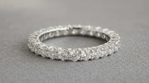Platinum eternity diamond wedding bands for women reflecting natural light