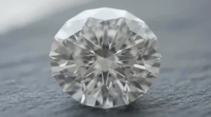 Macro photograph showing the precise facet cuts of a moissanite vs diamond engagement ring center stone.